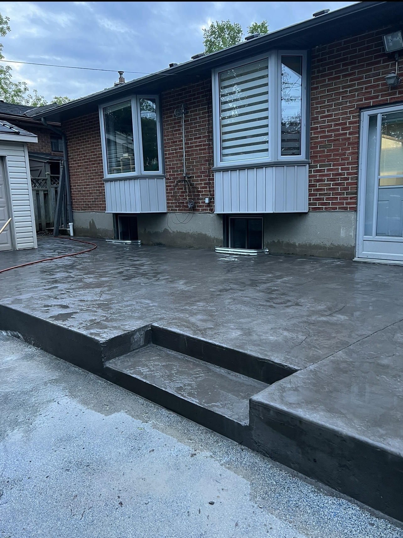 Fresh concrete driveway installation by Moussa Concrete in London Ontario